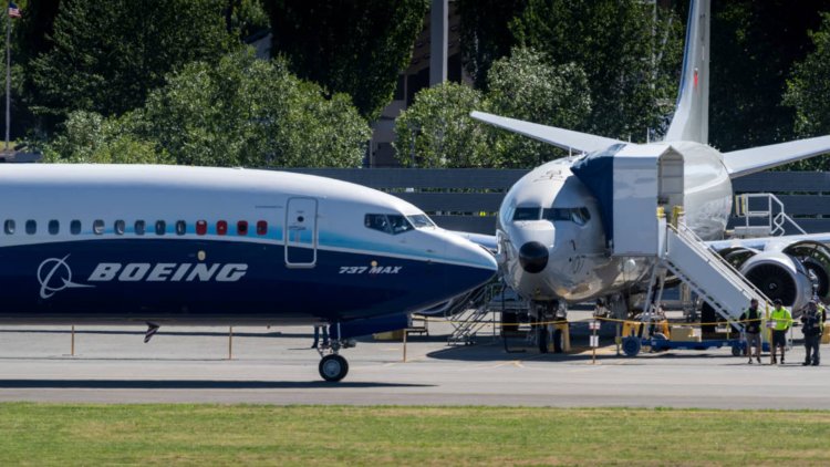 Boeing reports quarterly loss on problems in Air Force One, tanker programs