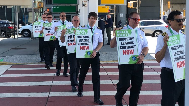 Delta pilots vote in favor of potential strike as contract talks drag on