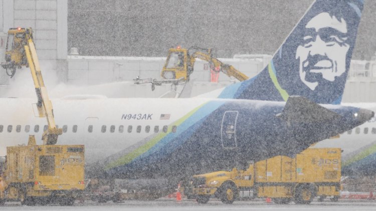 Airlines cancel thousands of flights as massive winter storm and bitter cold sweep U.S. ahead of Christmas