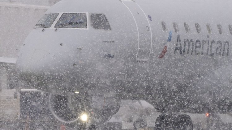 FedEx and UPS warn storm could delay holiday packages, airlines cancel another 4,000 flights