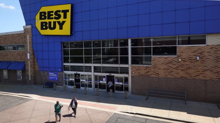 Best Buy tops holiday-quarter expectations but warns of further sales declines in the coming year